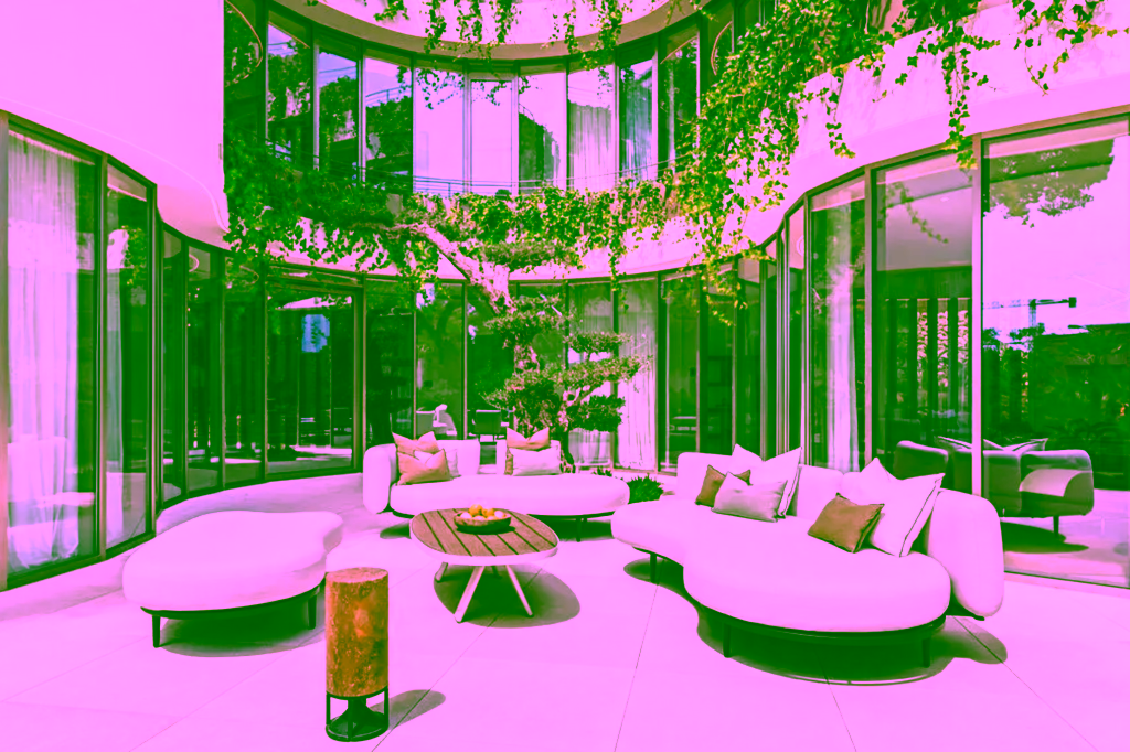 Modern patio with seating area, large windows, and climbing plants.